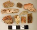Chipped stone, flakes, prismatic blades, and cores, some with possible retouching or use wear; stemmed projectile point fragment; biface fragment; quartz flake; calcined bone fragments