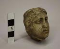 Head, stone, circa 5th century BC