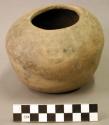 Ceramic complete vessel, jar, black-on-white exterior, flat base