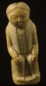 Carved ivory figure, representing white man