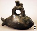 Black pottery vessel, fish