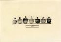 Seven tiny vessels from burials, some of which were found in graves of children