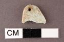 Fragment of turquoise pendant with perforation at one end - 1.3 x 1.2 x .2 cm.