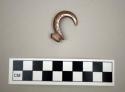 Fish hook of haliote shell. 3.5x2.5x0.5 cm.