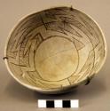 Small pottery bowl--escavada black on white