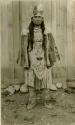 Thompson River Indian woman "Christine TsEkenelxEmux" in native costume, including pelt coat