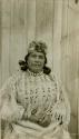 Thompson River Indian (Salishan) woman "KulumtinEk" in costume, near Spences Bridge