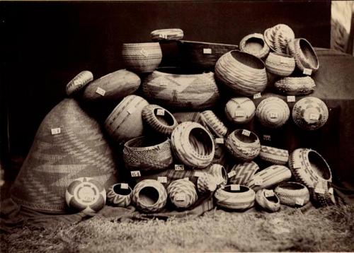 Displays of baskets; "Pomo and related kin groups" from H. N. Rust, California