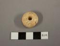 White stone bead or spindle whorl