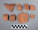 Multiple sherds, white on red design, possibly bowl or pot