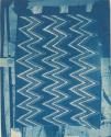 Navajo blanket with a zig-zag pattern