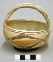 Polychrome pottery basket-shaped bowl - red, yellow, brown
