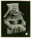 Effigy urn of male personage with the glyph "C" in headdress