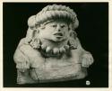 Effigy urn of female personage attired in the habiliaments of the goddess who wears the headdress of Yalalteca