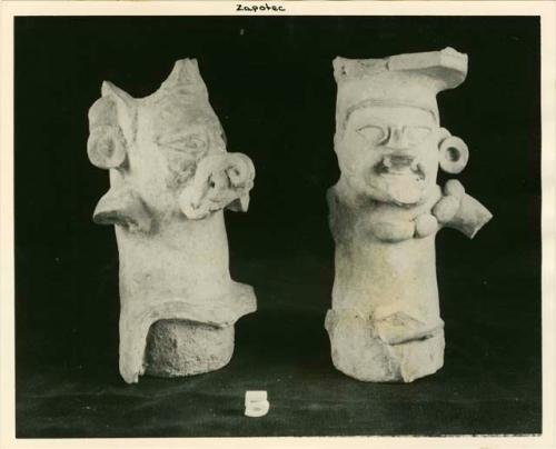 Urns depicting the god with the buccal mask of a serpent