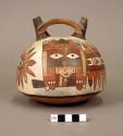 Double spout bottle painted with two polychrome serpentine creatures