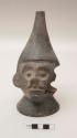 Effigy vessel, man or monkey with pointed cap; handle, anular base; repaired, pieces missing