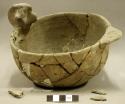 Ceramic complete effigy vessel, heavily mended, zoomorphic design, maybe a bird