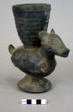 Black ware llama vase