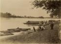River scene - people, bamboo boats and rafts
