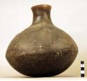 Large black ware globular pottery vessel with neck