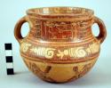 Two-handled Yojoa polychrome pottery bowl, bold anamalistic style.