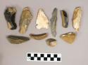 Chipped stone, including blades, blade cores, serrated blades, worked blades/flakes, scrapers, and a side-notched projectile point