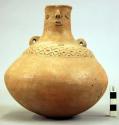 Pottery vase, red, human face and incised ornament