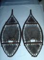 Pair of small snow shoes--wood frames and rawhide webbing