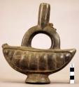 Pottery jar mouth in center of cross handle, vegetable-shape