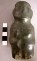 Polished stone figurine (basalt?).  Mezcala-type.  Appears to be a female figure
