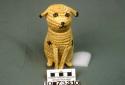 Coiled basketry seated dog (A) with removable head (B)
