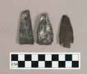 Chipped stone projectile points, including a corner-notched projectile point