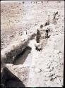 Men excavating trench, looking north, rooms 36, 37, 39, 48