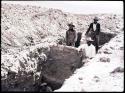 Three Hopi men excavating a trench