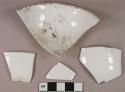 White undecorated porcelain vessel rim with body fragments, 1 rim fragment with spout, white paste, likely apothecary or scientific ceramics
