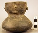 Pottery vase human face