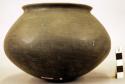 Ceramic jar, plain, flaring rim, rounded body & base