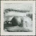 Photograph album, Yaruro fieldwork, p. 60, photo 1, decorated object on woven sack