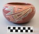 Polychrome-on-red bowl:  geometric motif