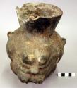 Ceramic jar, animal effigy, moulded face,rounded base, sherds missing from rim