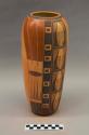 Polychrome-on-reddish brown vase:  Sikyatki Revival and geometric motifs