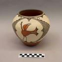 Polychrome-on-white bowl:bird motif