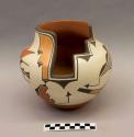Polychrome-on-white olla with open stepped side