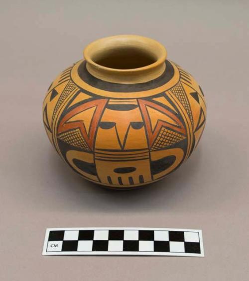 Polychrome-on-buff jar: geometric motif