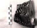 Fragment of black incised straight-sided flat-bottomed pottery tipod bowl