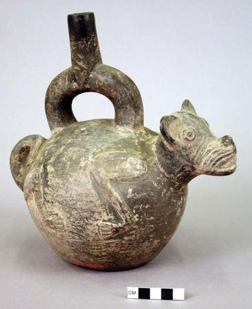 Ceramic bottle, stirrup spout, animal effigy, molded head & tail, engraved leg
