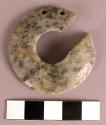 Flared ear plug or pendant.  Two perforations.  Mended.  One section missing.  O