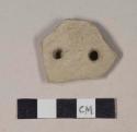 Buff bodied earthenware rim sherd, unslipped, with two pierced holes