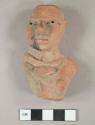 Figurine, red clay, female archaic